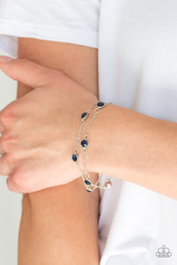 Spotlight Starlight - Blue Rhinestone - Clasp Bracelet - Paparazzi Accessories