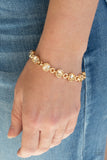 First In Fashion Show - Gold - Clasp Bracelet - Paparazzi Accessories